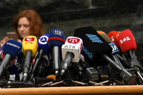 Microphones on a podium
